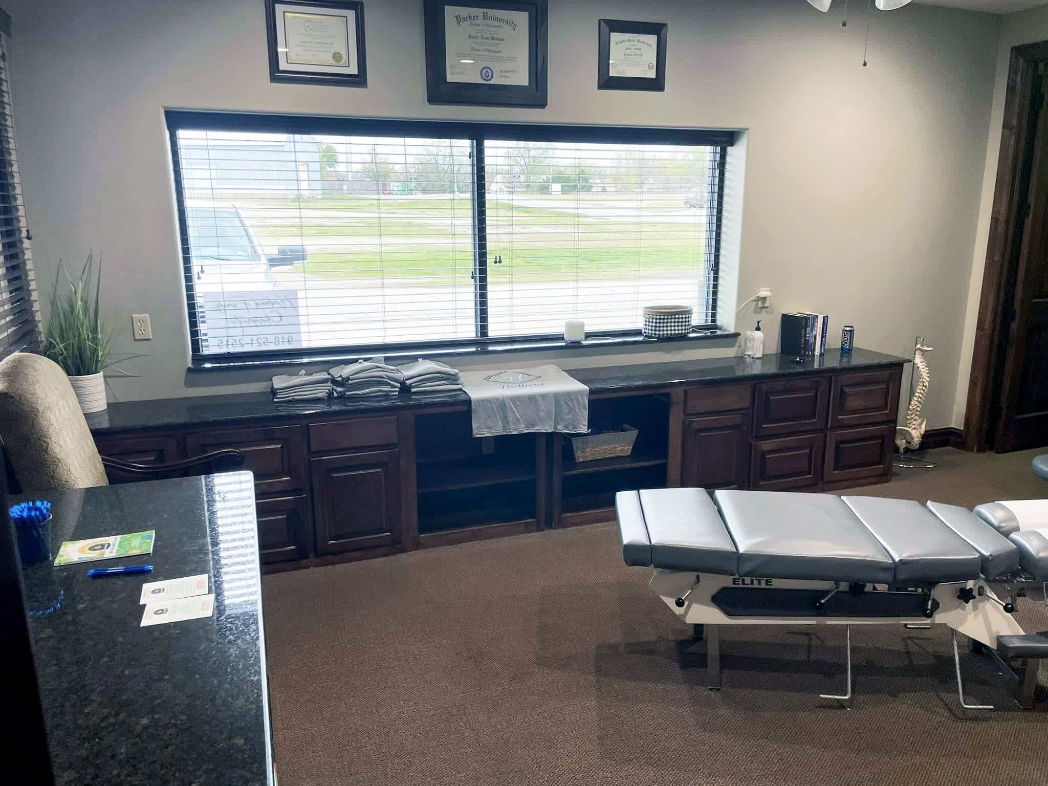 Hedlund Family Chiropractic Collinsville Office With T Shirts